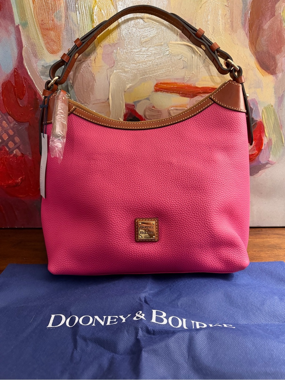 NWT and Dust cover Dooney & Bourke Pink Pebble Leather Hobo Bag